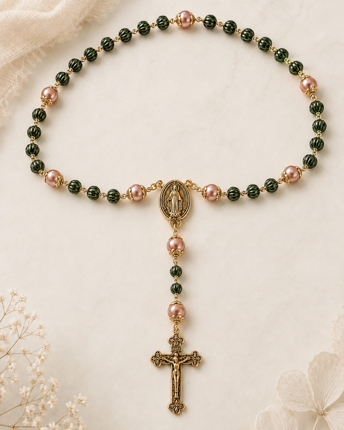 Tactile rosary with dark green ridged beads and rose gold accents